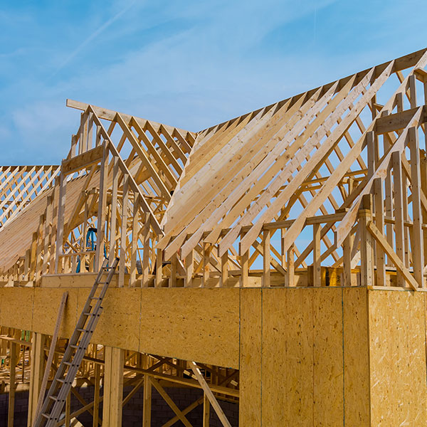 Image of UrCovered Construction owners standing side by side